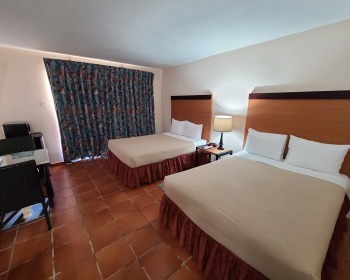 Parador Palmas de Lucia Hotel Room